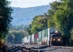 Another eastbound intermodal comes around the bend at Cove